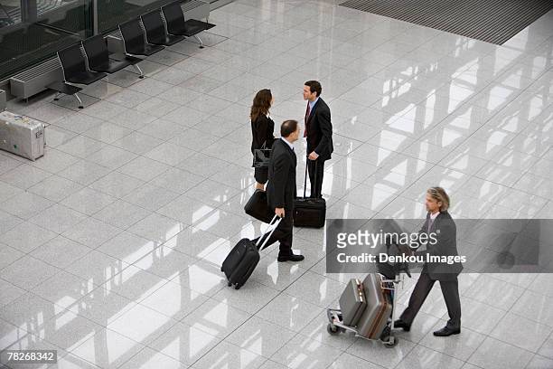 business people at the airport. - cartgate out stock pictures, royalty-free photos & images