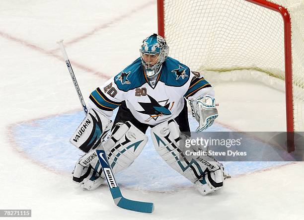 Goalie Evgeni Nabakov of the San Jose Sharks tends the net in the hockey game against the Colorado Avalanche at the Pepsi Center on December 3, 2007...