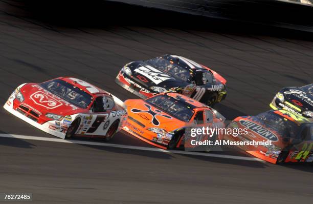 Kasey Kahne leads a pack of cars during the NASCAR NEXTEL Cup series Coca-Cola 600 May 28, 2006 at Lowe's Motor Speedway in Charlotte, North Carolina.