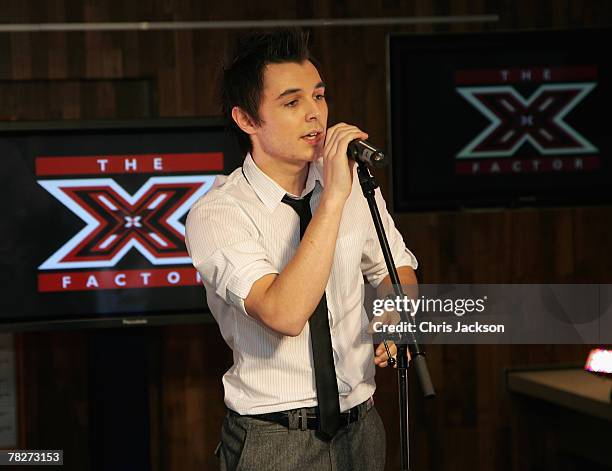 Leon Jackson performs during the X Factor Finals Photocall and performance at the Carphone Warehouse on Oxford Street on December 5, 2007 in London,...