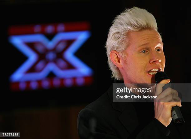 Rhydian Roberts sings during the X Factor Finals Photocall and performance at the Carphone Warehouse on Oxford Street on December 5, 2007 in London,...