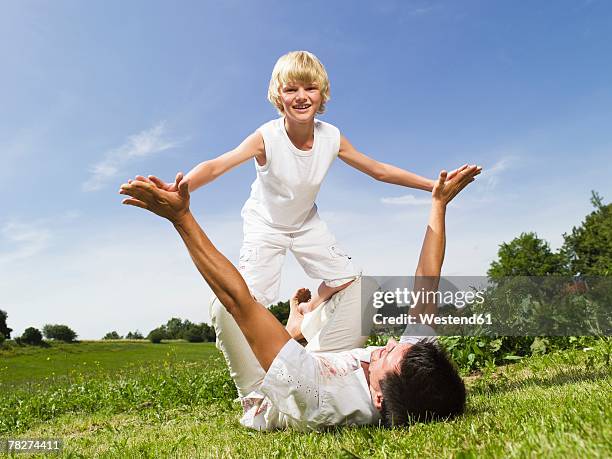 With Dad 7,423 Father With Child On Back Stock Photos, High-Res Pictures, and ...