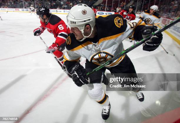 Jeremy Reich of the Boston Bruins skates against the New Jersey Devils at the Prudential Center December 5, 2007 in Newark, New Jersey.