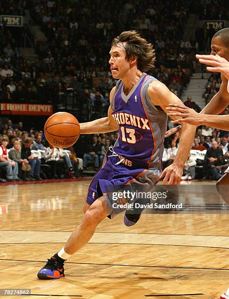 Steve Nash of the Phoenix Suns drives to the net against the Toronto Raptors on December 5, 2007 at the Air Canada Centre in Toronto, Canada. NOTE TO...