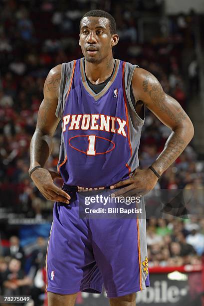 Amare Stoudemire of the Phoenix Suns looks on during the game against the Houston Rockets at the Toyota Center on November 17, 2007 in Houston,...