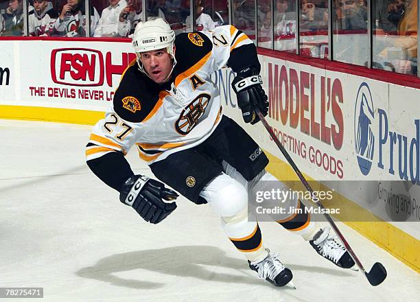 Glen Murray of the Boston Bruins skates against the New Jersey Devils at the Prudential Center December 5, 2007 in Newark, New Jersey.