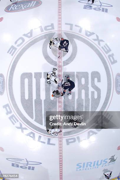 The opening face-off during Sidney Crosby of the Pittsburgh Penguins' first game ever against the Edmonton Oilers at Rexall Place on December 5, 2007...