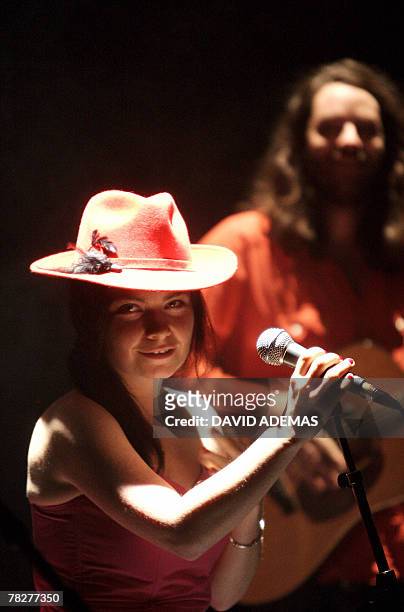 Becky Jacobs, singer of the British Tunng, performs with her group, 05 December 2007 at the Aire Libre concert hall in Rennes, western France, during...