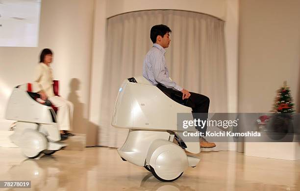 Toyota launches a Mobility Robot "Mobina" at Universal Design Showcase on December 6,2007 in Tokyo, Japan. The robot is able to move over uneaven...