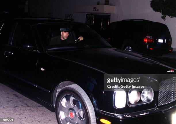 Actor Nicolas Cage leaves the Las Palmas Club in his Rolls Royce December 27, 2000 in Hollywood, CA.