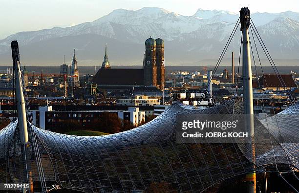 View taken 05 December 2007 shows the southern German city of Munich with the 1972 Olympic stadium in the foreground, the landmark Church of our Lady...