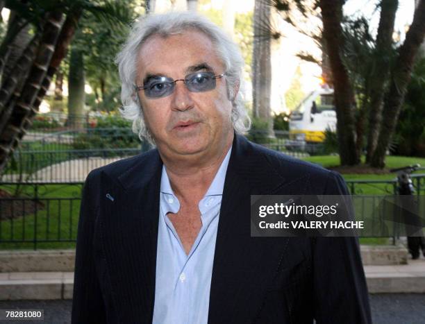 Renault team principal Flavio Briatore arrives to attend a world motor sport council during which Renault is to answer a charge of unauthorised...