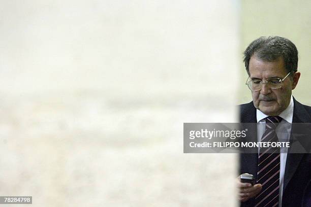 Italian Prime Minister Romano Prodi awaits Senegal's President Abdoulaye Wade for a meeting in Rome's Palazzo Chigi, 06 December 2007. Italy's...