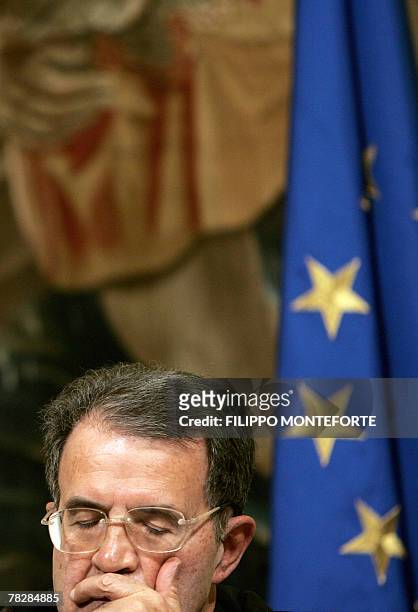 Italian Prime Minister Romano Prodi follows Senegal's President Abdoulaye Wade speach during their meeting in Rome's Palazzo Chigi, 06 December 2007....