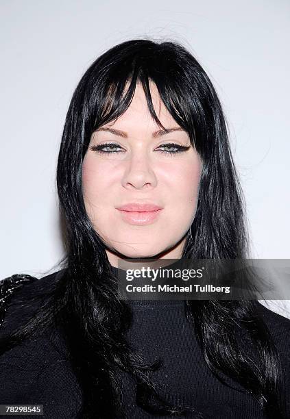 Actress Chyna poses on the red carpet at the Flaunt Magazine 9-Year Anniversary Bash & Holiday Toy Drive held at the Green Door nightclub on December...