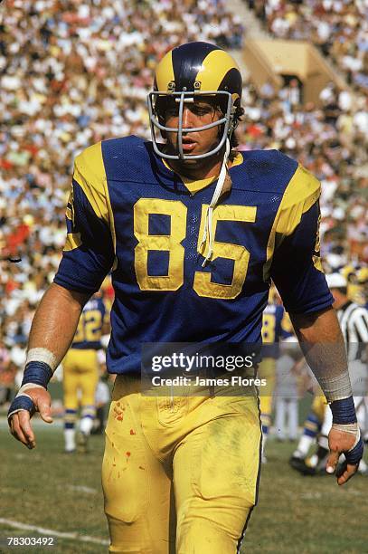 Defensive end Jack Youngblood walks off the field against the Dallas Cowboys at the Los Angeles Memorial Coliseum on October 14, 1973 in Los Angeles,...