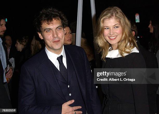 Director Joe Wright and actress Rosmund Pike arrives at the Los Angeles Premiere of Focus Features' "Atonement" held on December 6, 2007 at The...