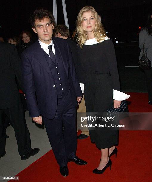 Director Joe Wright and actress Rosmund Pike arrives at the Los Angeles Premiere of Focus Features' "Atonement" held on December 6, 2007 at The...