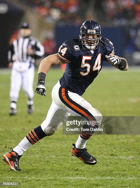 Brian Urlacher of the Chicago Bears follows the play action during an NFL game against the Denver Broncos at Soldier Field on November 25, 2007 in...