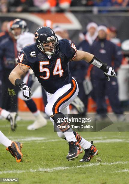 Brian Urlacher of the Chicago Bears follows the play action during an NFL game against the Denver Broncos at Soldier Field on November 25, 2007 in...