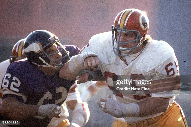 Defensive tackle Dave Butz of the Washington Redskins takes on center Ed White of the Minnesota Vikings in the 1976 NFC Championship Game on December...