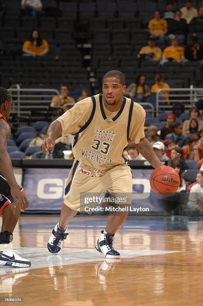 Maureece Rice Maureece Rice of the George Washington Colonials dribbles the ball ...