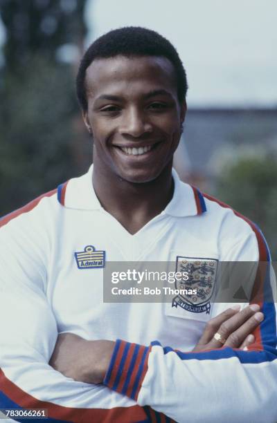 English professional footballer Cyrille Regis of West Bromwich Albion posed wearing an England national football team under-21 shirt, circa 1979.