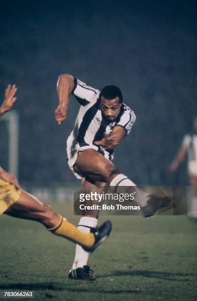 English professional footballer Cyrille Regis pictured in action for West Bromwich Albion in their League Cup Semi-final first leg match against...