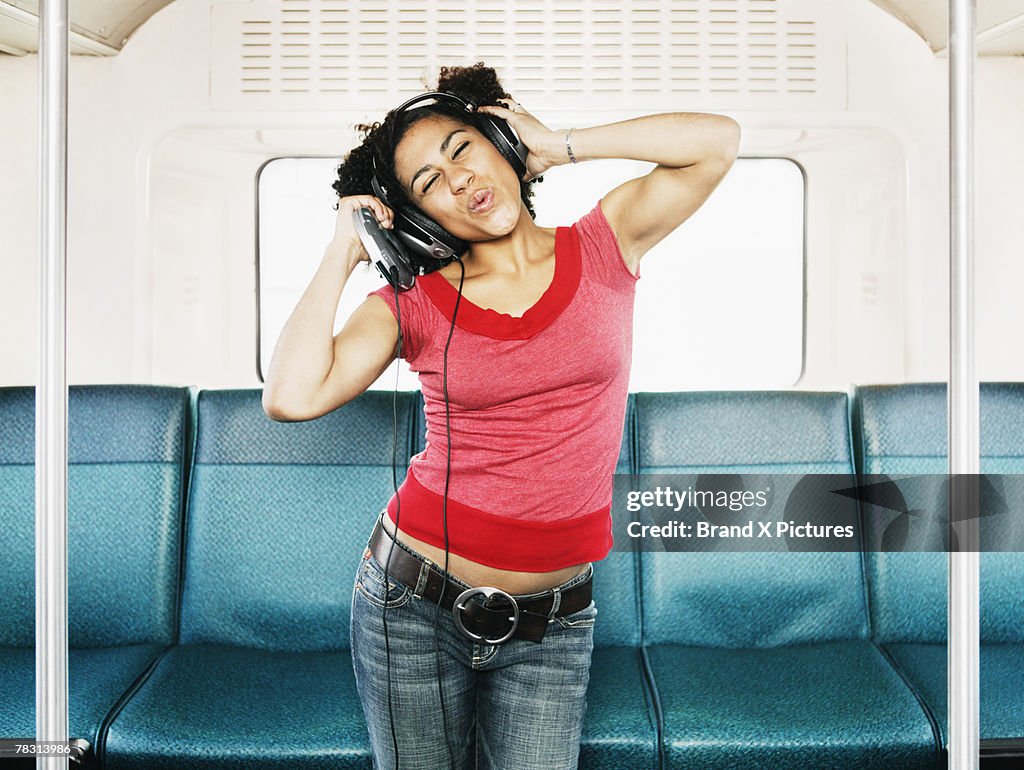 Woman dancing on bus