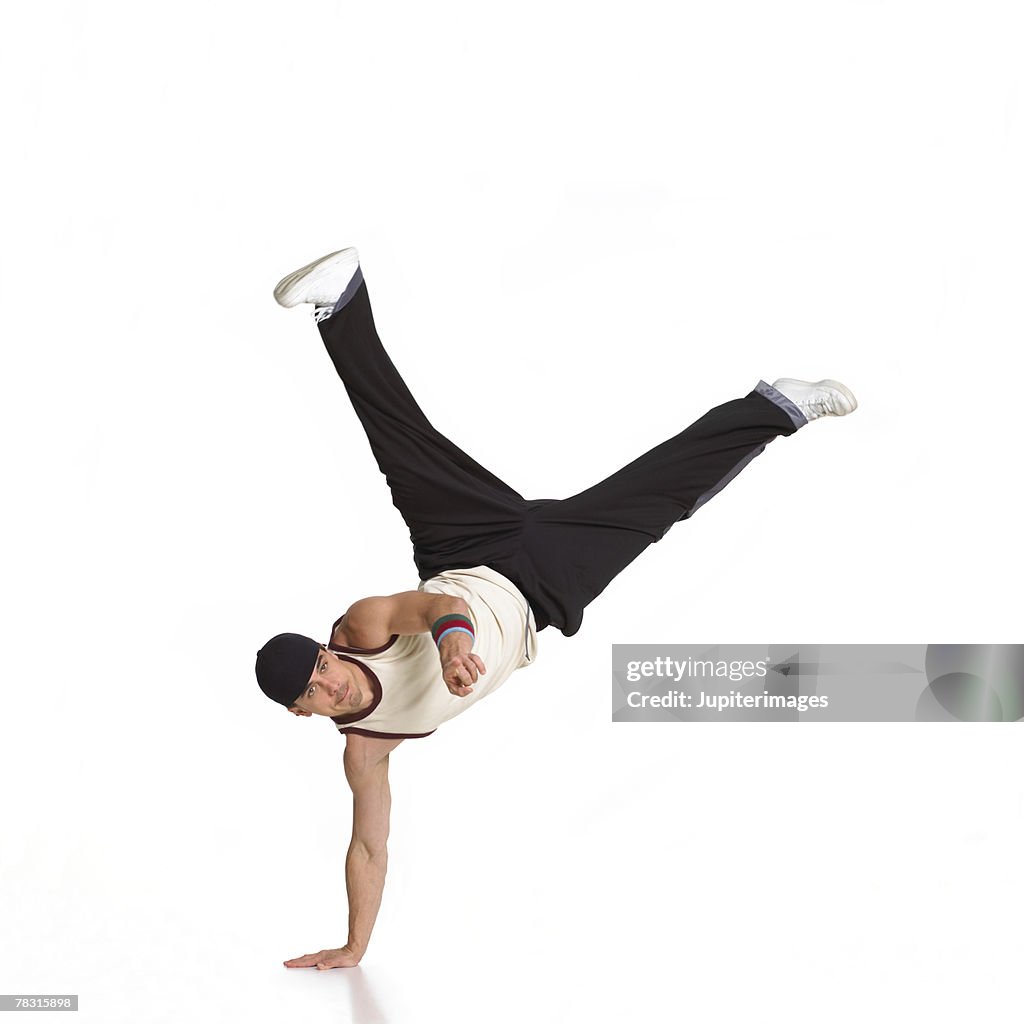 Man Balancing on One Hand