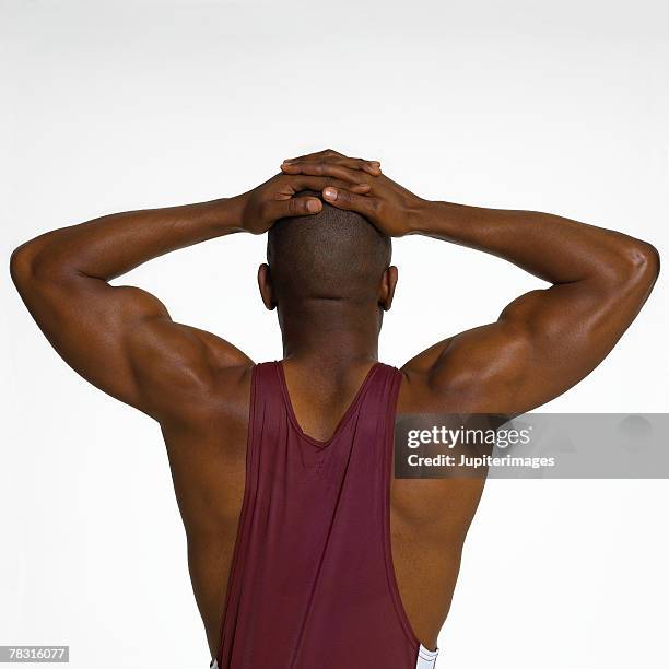 back of man with hands on head - shaved-buzz-cut-back-of-head photos et images de collection