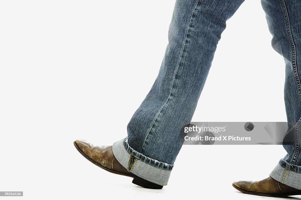 Legs in jeans and boots