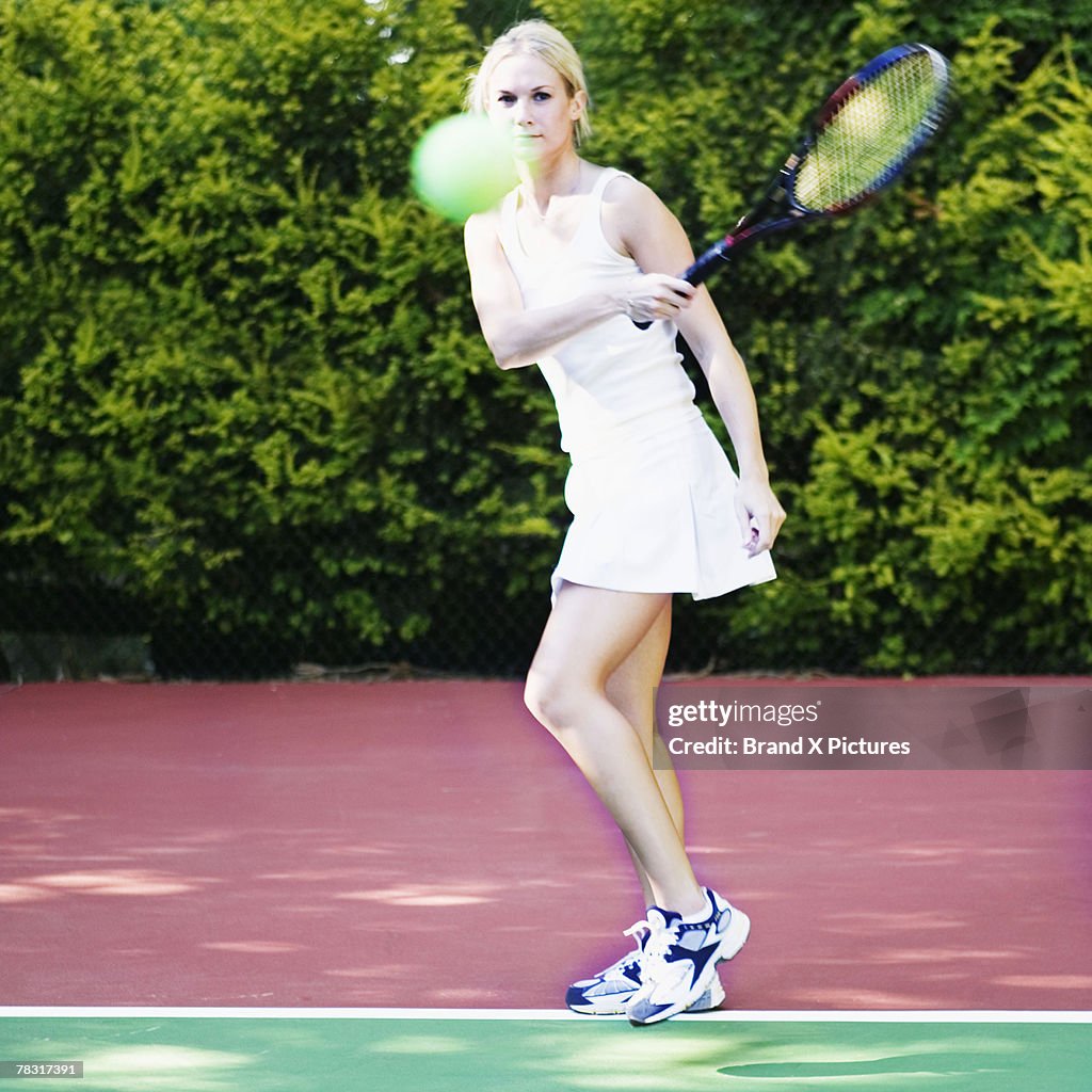 Woman playing tennis