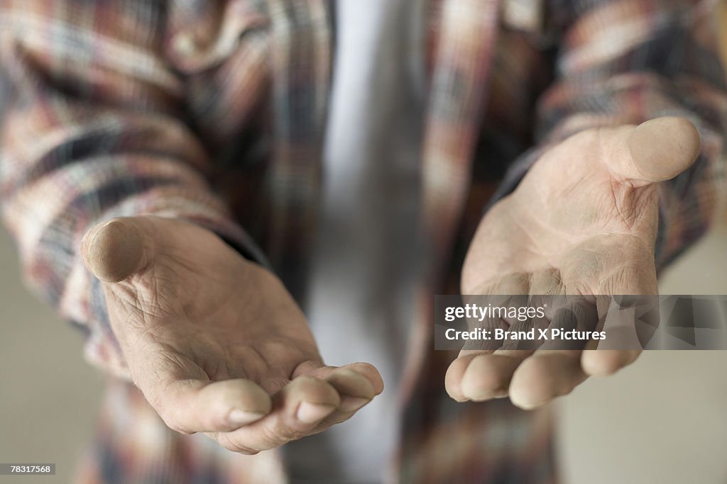 Man with dirty hands