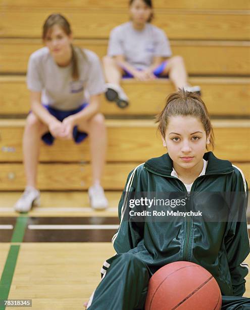 teenage girl with basketball - girl who stands stock pictures, royalty-free photos & images