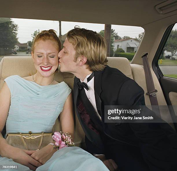 affectionate prom couple - prom kisses stock pictures, royalty-free photos & images