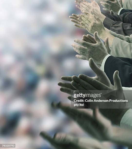 crowd applauding - shareholder stock pictures, royalty-free photos & images