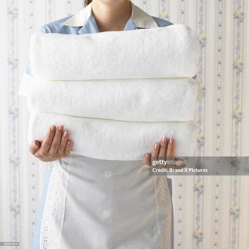 Maid with clean towels