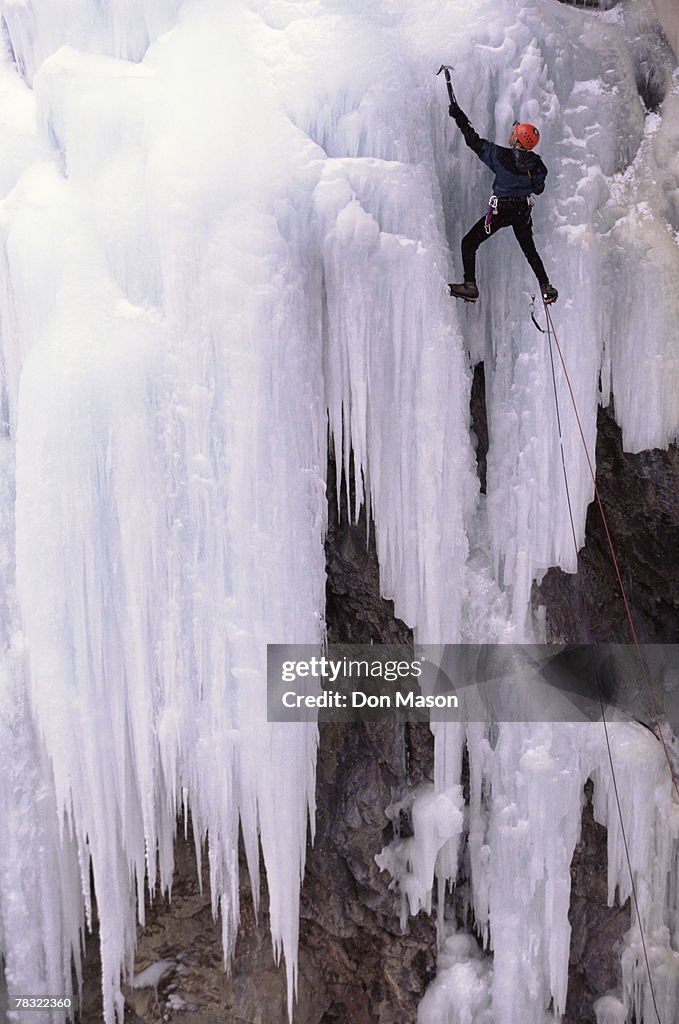 Person ice climbing