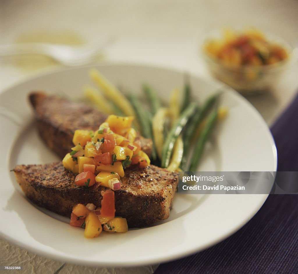 Bronzed pork medallions with papaya salsa