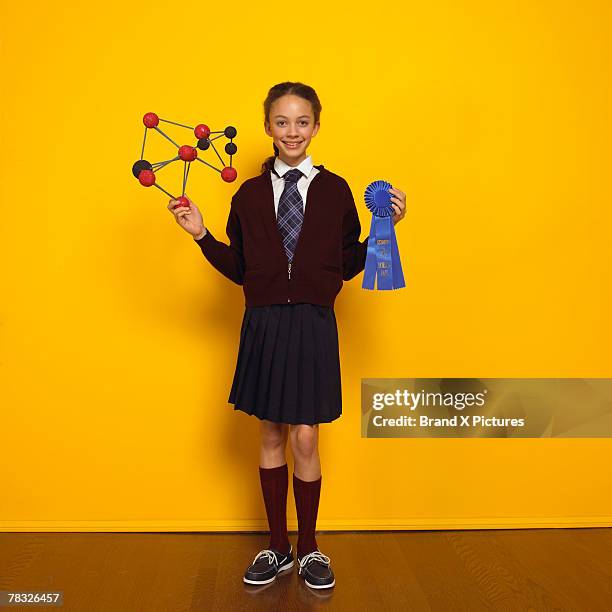 girl with chemistry model and prize - awards inside imagens e fotografias de stock