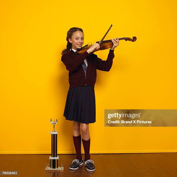 violin player with trophy - brandung bildbanksfoton och bilder