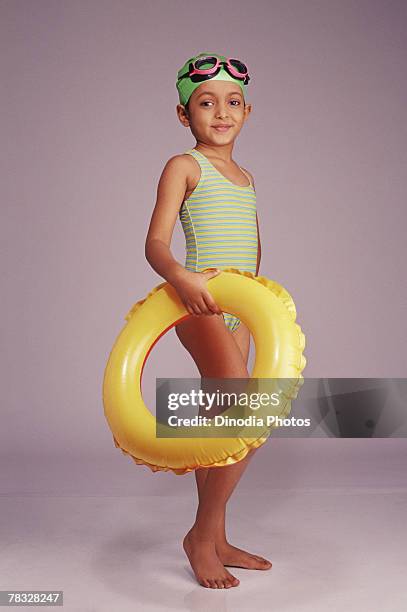 girl dressed in swimming apparel - schwimmer freisteller stock-fotos und bilder