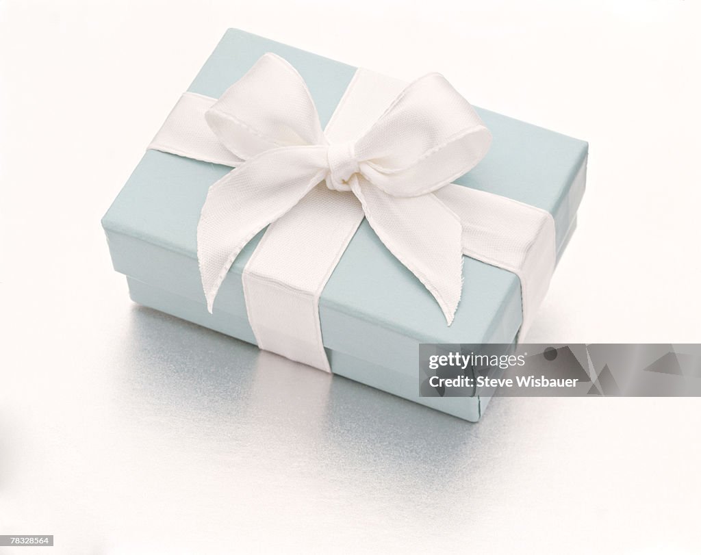 Blue present with white ribbon