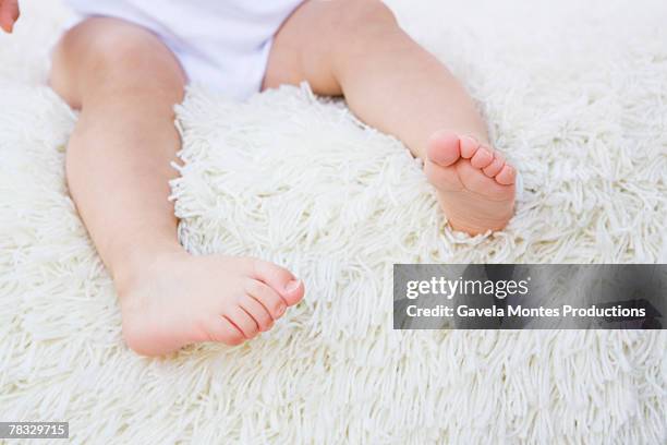 baby's legs - shag rug stock pictures, royalty-free photos & images