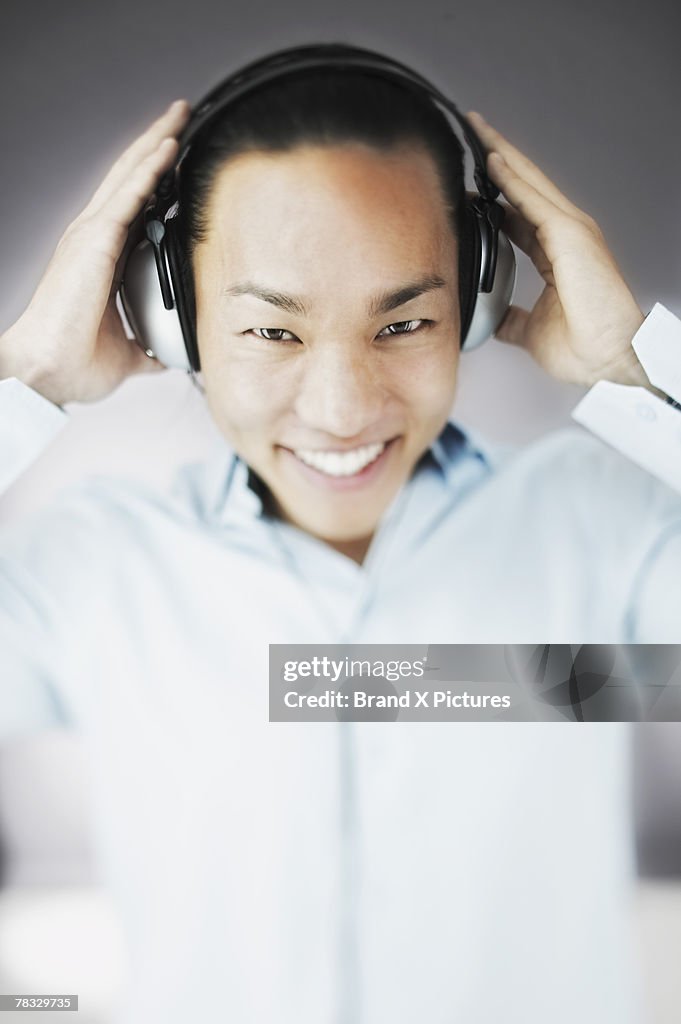 Smiling man with headphones