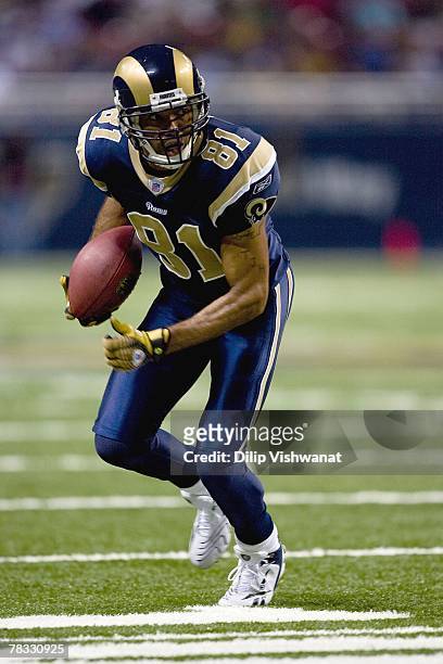 Torry Holt of the St. Louis Rams carries the ball during the NFL game against the Atlanta Falcons at Edward Jones Dome on December 2, 2007 in St....
