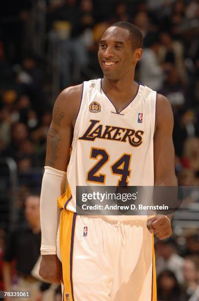 Kobe Bryant of the Los Angeles Lakers cracks a smile during the game against the New Jersey Nets at Staples Center on November 25, 2007 in Los...