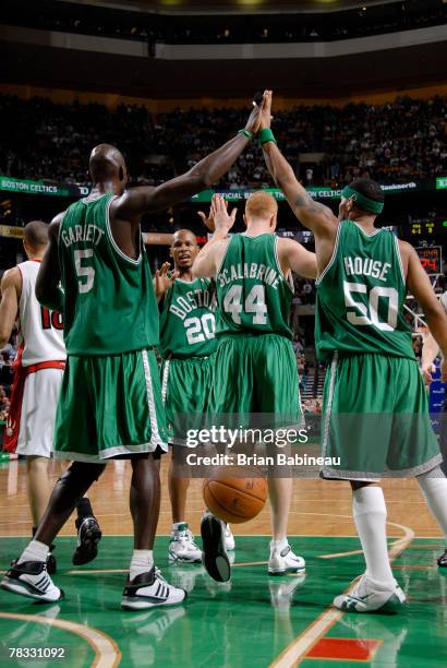 The Boston Celtics celebrate during the game against the Toronto Rapters at the TD Banknorth Garden December 7, 2007 in Boston, Massachusetts. NOTE...