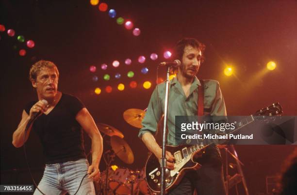 Roger Daltrey and Pete Townshend of The Who perform live on stage at the Capitol Theater, Passaic, New Jersey on 10th September 1979. Townshend plays...